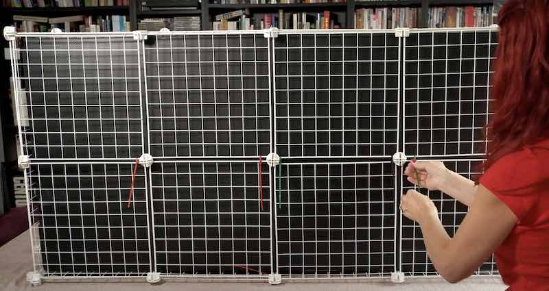 Adding base grids to form a stable bottom for the cage